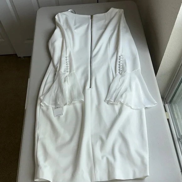 Elegant Calvin Klein White Dress with Flared Sleeves. - Picture 8 of 15